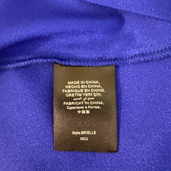 “BEBE” Brielle Bell Sleeve Asymmetrical Blouse - Picture 11 of 12